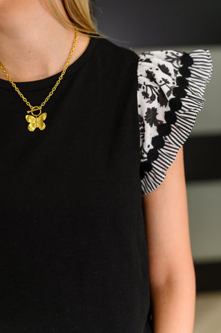 One Eleven North Contrast Flutter Sleeve Top in Black