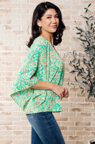 Emily Wonder The Future's Open Wide V-Neck Batwing Top